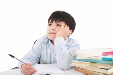 Upset-School-Boy-Doing-Homework-by-David-Castillo-Dominici-FreeDigitalPhotosnet