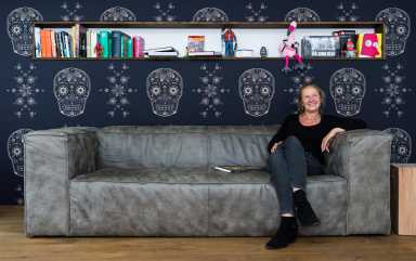 woman sitting on couch