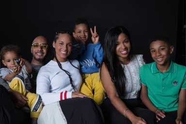 family photo with three adults and two kids