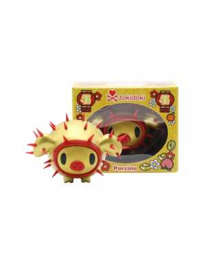 red and gold spiky pig collectible toy next to box