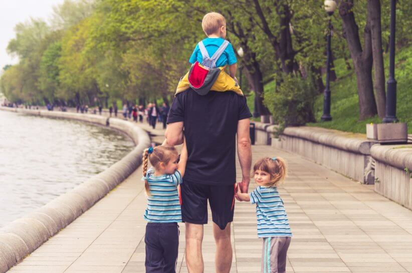 Family walking through the park