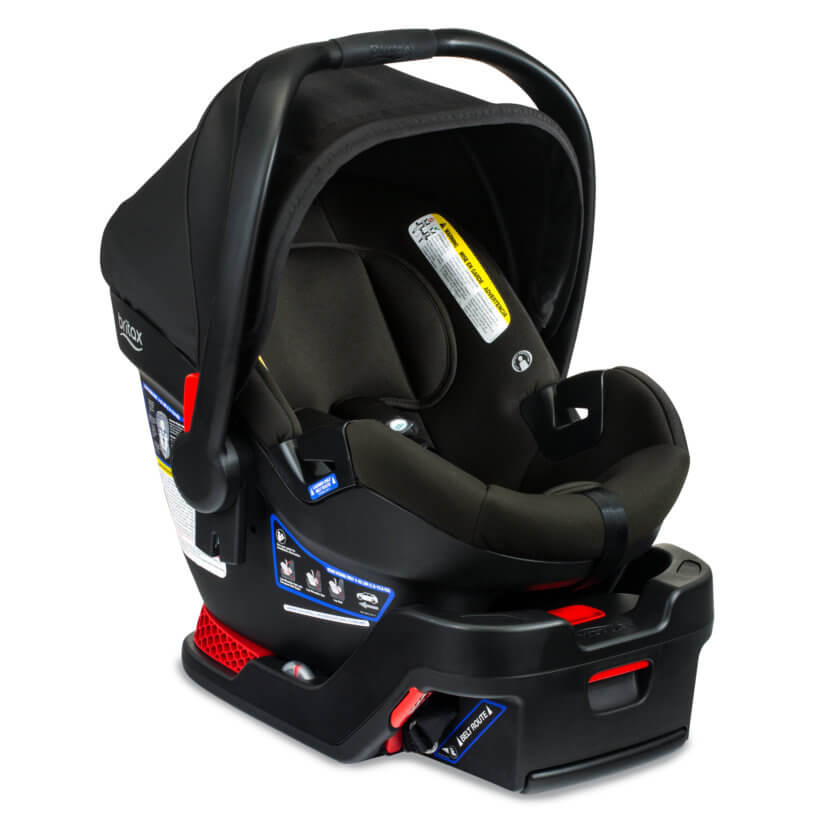 A sleek, Eclipse-black infant car seat (Britax B-Safe Gen2) shown from multiple angles, highlighting its deep seat, canopy, and safety harness.